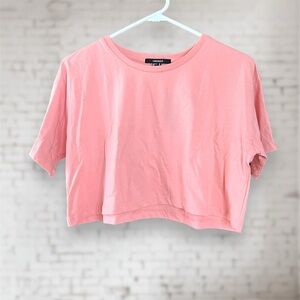 Forever 21 Cropped T-shirt. 60% Cotton, 40% Polyester. Size Medium. NWT.